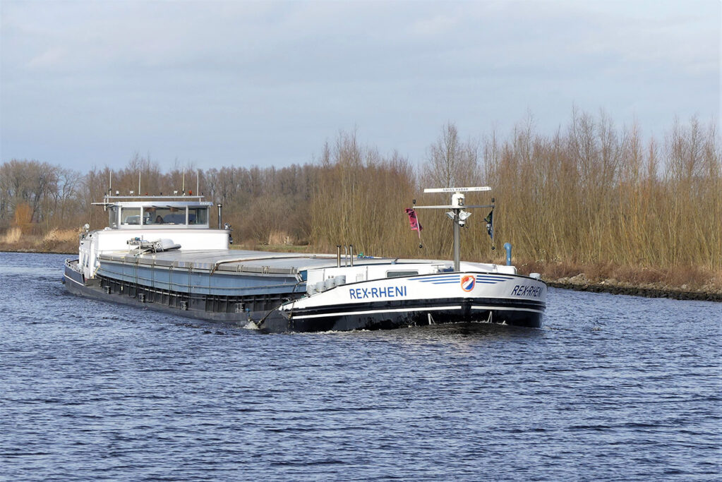 REX-RHENI